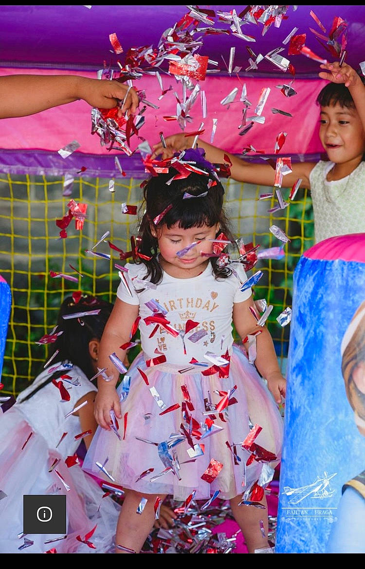 Estella is registered to the contest to win money with this photo: child, dress, entertainment, event, fashion_design, fun, happy, hat, leisure, magenta, pattern, performing_arts, person, pink, recreation, smile, summer, textile, toddler, world