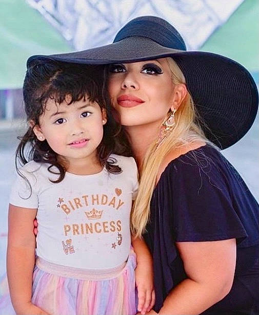 Estella is registered to the contest to win money with this photo: cap, clothing, cool, fashion_design, fedora, flash_photography, fun, gesture, hairstyle, happy, hat, headwear, joy, lip, long_hair, neck, person, pink, shoulder, skin