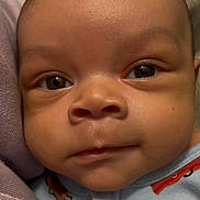 Kasai joined the competition — help win amazing prizes! baby, close_up, face, infant, child, cute, eyes, skin, clothing, fabric, portrait, newborn, young, expression, indoors, human, person, pacifier_clip, soft_lighting, calm