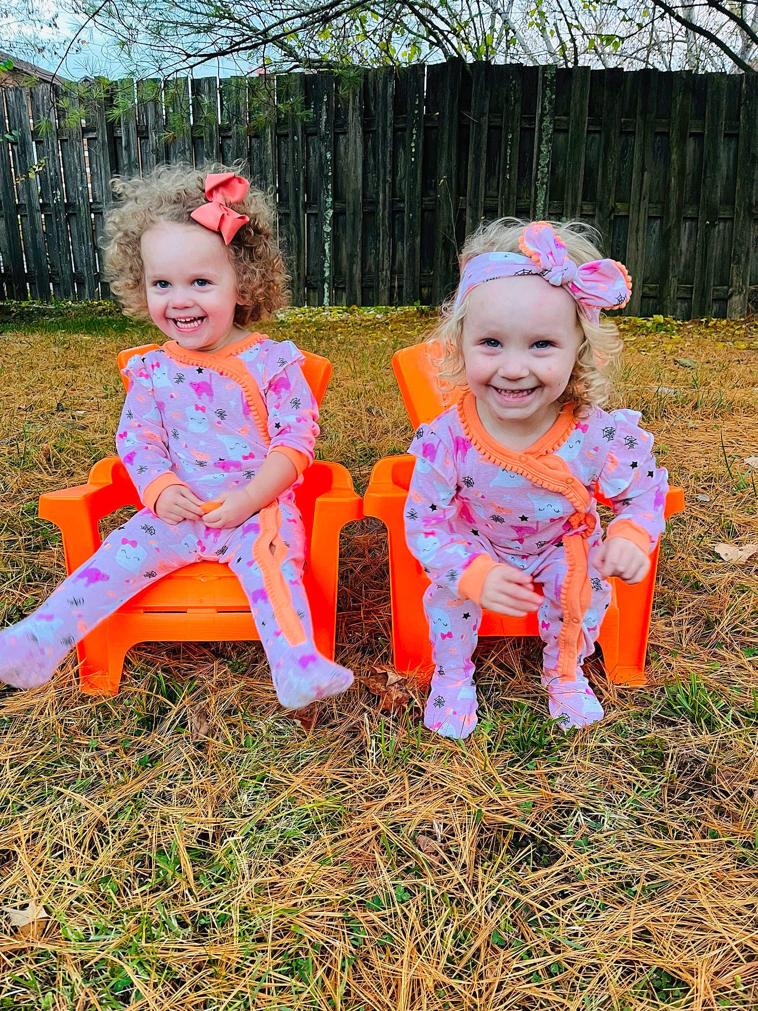 Madeline joined the competition — help win amazing prizes! baby_toddler_clothing, child, eye, facial_expression, fun, grass, grassland, happy, headwear, joy, leaf, meadow, people_in_nature, person, pink, plant, playing_with_kids, recreation, sitting, sky