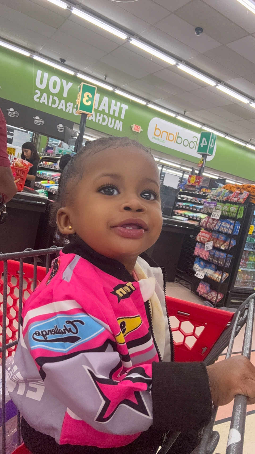 Dalylah joined the competition — help win amazing prizes! baseball, baseballbat, bodypart, candy, child, face, female, finger, food, girl, grocerystore, head, indoors, market, person, shop, shopping, sport, supermarket, sweets