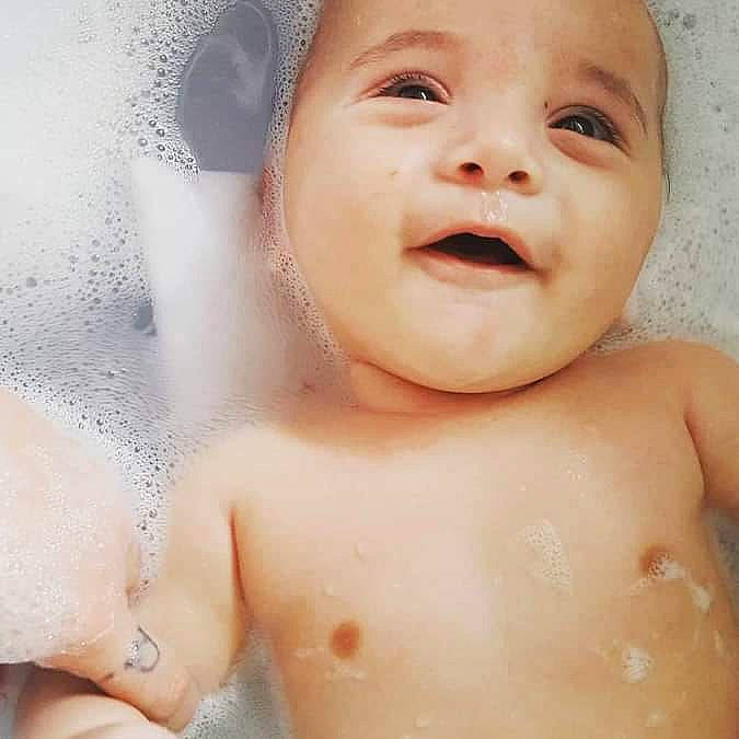 Izayah is registered to the contest to win money with this photo: baby, baby_bathing, baby_making_funny_faces, bathing, beauty, cheek, child, chin, close_up, eye, face, facial_expression, forehead, head, lip, mouth, nose, person, skin, smile