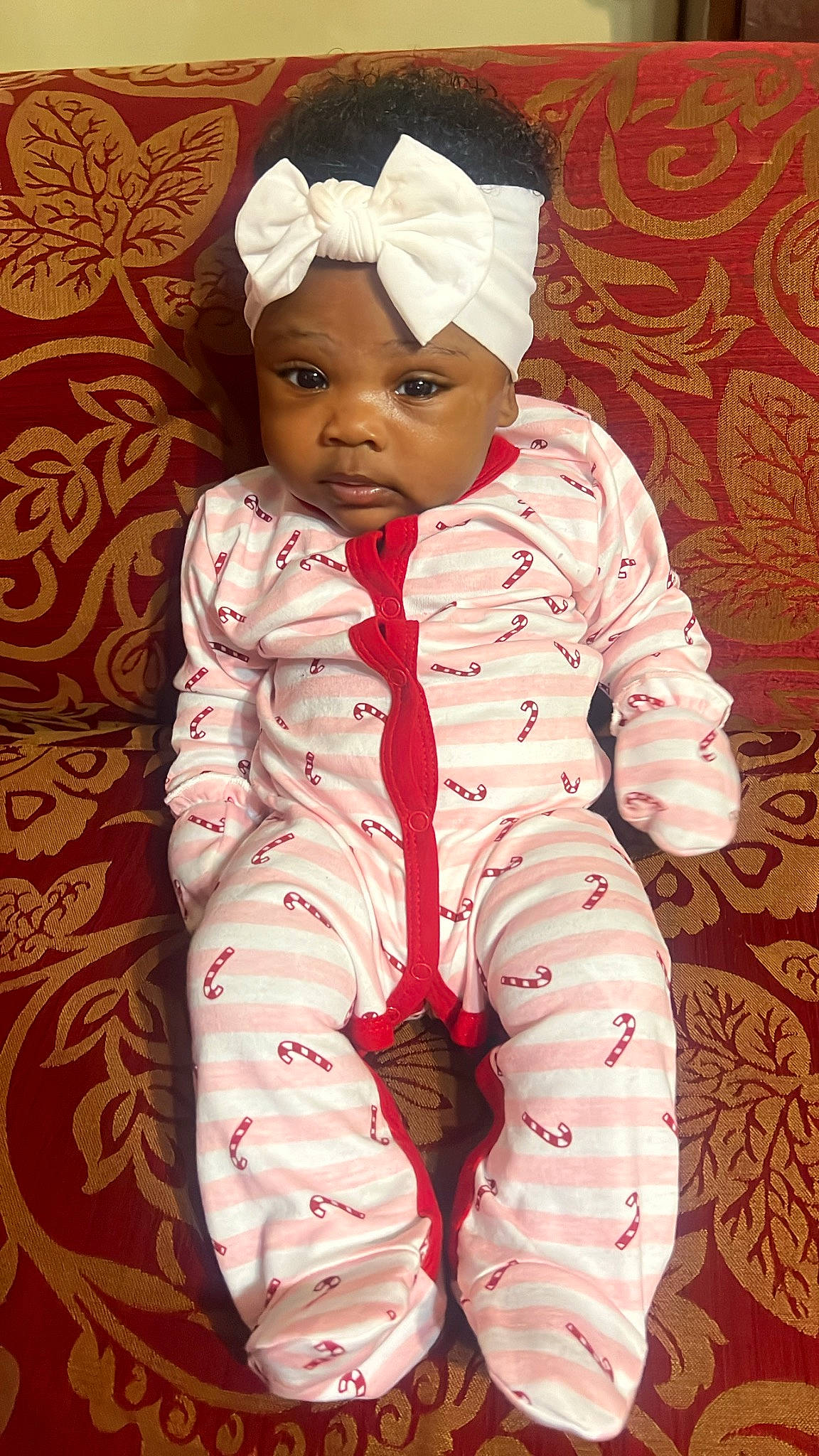 Naomi joined the competition — help win amazing prizes! baby, baby_toddler_clothing, carmine, cheek, child, collar, comfort, face, happy, head, headgear, headwear, linens, magenta, pattern, peach, person, pink, sleeve, thigh