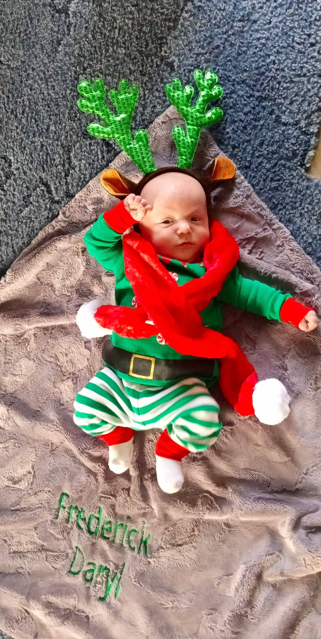 Frederick joined the competition — help win amazing prizes! baby, baby_toddler_clothing, child, christmas, fictional_character, foot, fun, fur, grass, green, happy, linens, pattern, people_in_nature, person, play, sitting, sleeve, soil, toddler