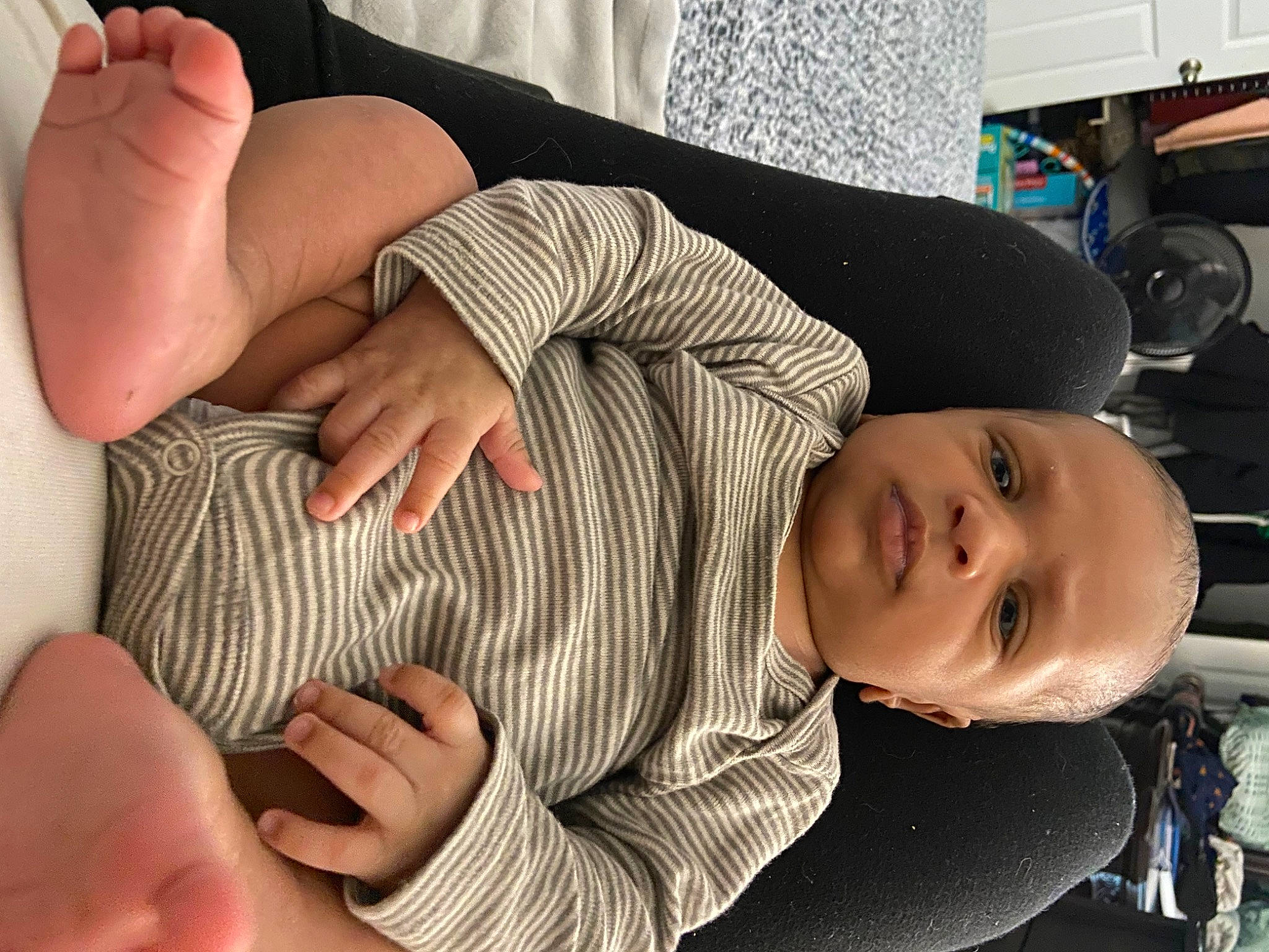 Jamier is registered to the contest to win money with this photo: arm, baby, baby_toddler_clothing, child, comfort, facial_expression, finger, gesture, hand, human_body, human_leg, joint, knee, leg, mouth, nail, person, product, skin, thumb