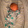 newborn, baby, sleeping, crib, onesie, clothing, infant, bed, sleep, cute, child, mattress, pattern, animal_print, furniture, rest, peaceful, soft, comfort, pajamas