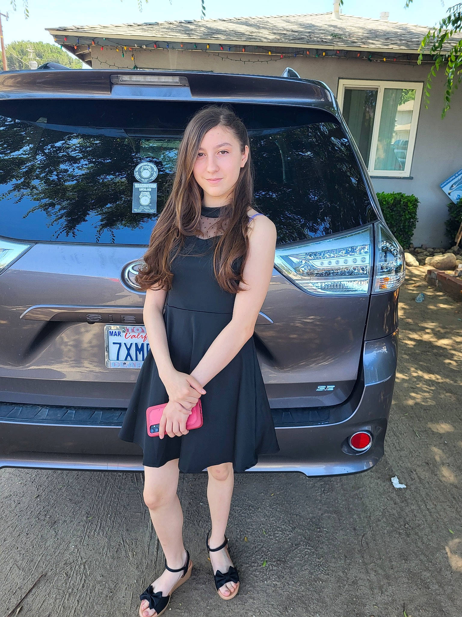 Alana Valdez is registered to the contest to win money with this photo: automotive_design, automotive_exterior, automotive_lighting, automotive_tire, black_hair, bumper, car, dress, hood, joy, knee, leg, motor_vehicle, person, personal_luxury_car, plant, rim, thigh, tire, vehicle