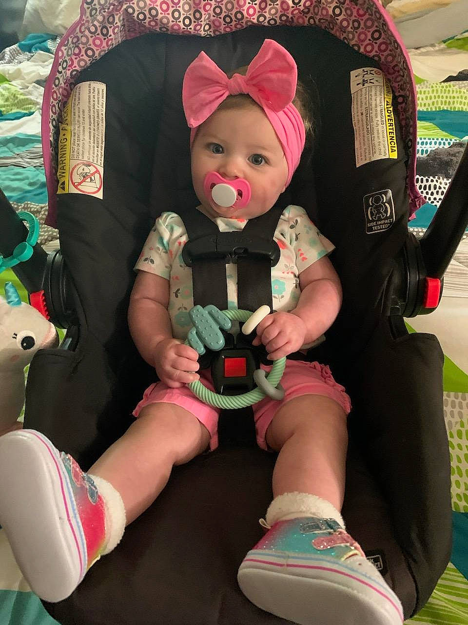 Claire joined the competition — help win amazing prizes! baby_products, costume_hat, doll, fictional_character, fun, grass, happy, head, headwear, human_leg, lap, leg, person, pink, plush, recreation, shoe, sitting, sock, stuffed_toy