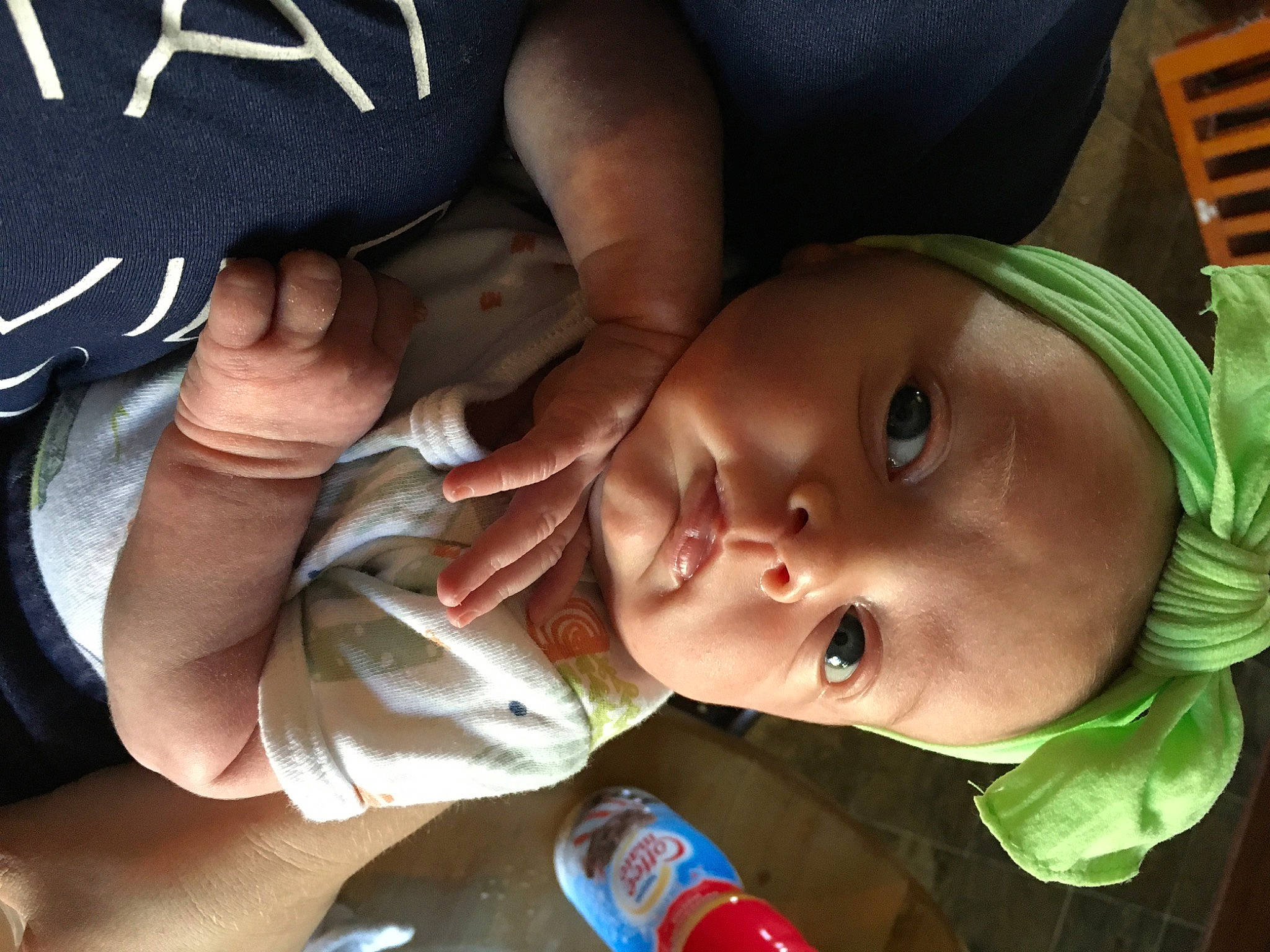 Nirvana is registered to the contest to win money with this photo: baby, cheek, child, ear, eye, finger, hand, head, lip, mouth, nail, nose, person, skin, thumb, toddler