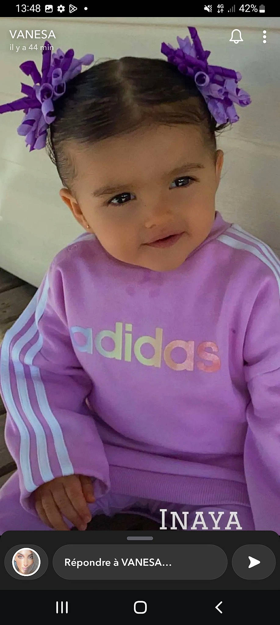 Inaya a rejoint le concours — aidez-le/la à gagner de superbes lots ! baby_toddler_clothing, cheek, chin, cool, eye, eyebrow, face, hair, hairstyle, happy, head, lip, person, pink, purple, skin, sleeve, smile, toddler, violet