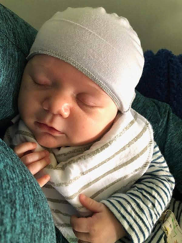 Gavin joined the competition — help win amazing prizes! baby, baby_toddler_clothing, cap, cheek, child, chin, comfort, cool, eye, eyebrow, gesture, hand, head, headwear, knit_cap, lip, mouth, nose, person, skin