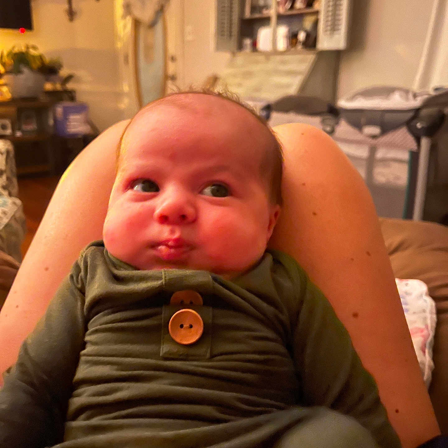 Liam is registered to the contest to win money with this photo: architecture, baby, bodypart, building, computerhardware, couch, electronics, face, finger, furniture, hand, hardware, head, indoors, livingroom, newborn, person, photography, portrait, room