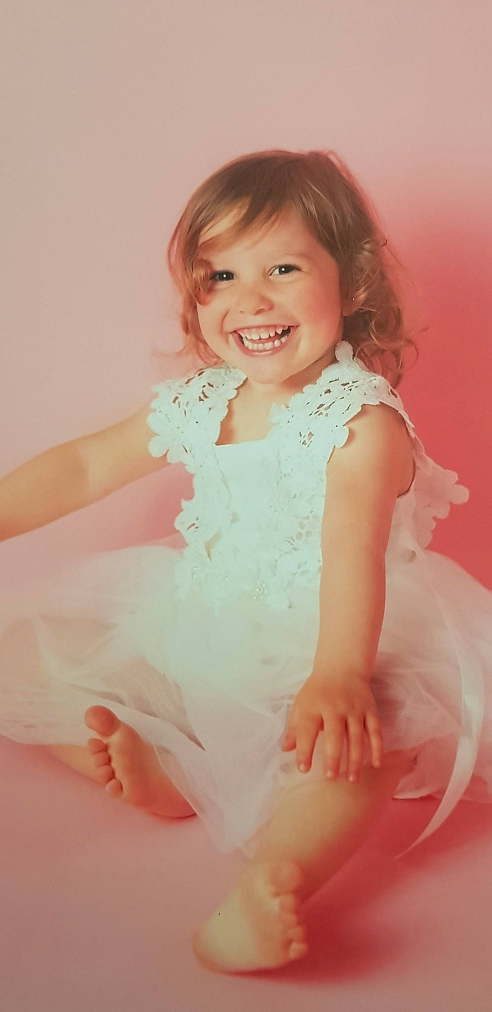 Anna a rejoint le concours — aidez-le/la à gagner de superbes lots ! baby, cheek, child, child_model, dress, joy, person, photography, pink, portrait, sitting, skin, smile, toddler