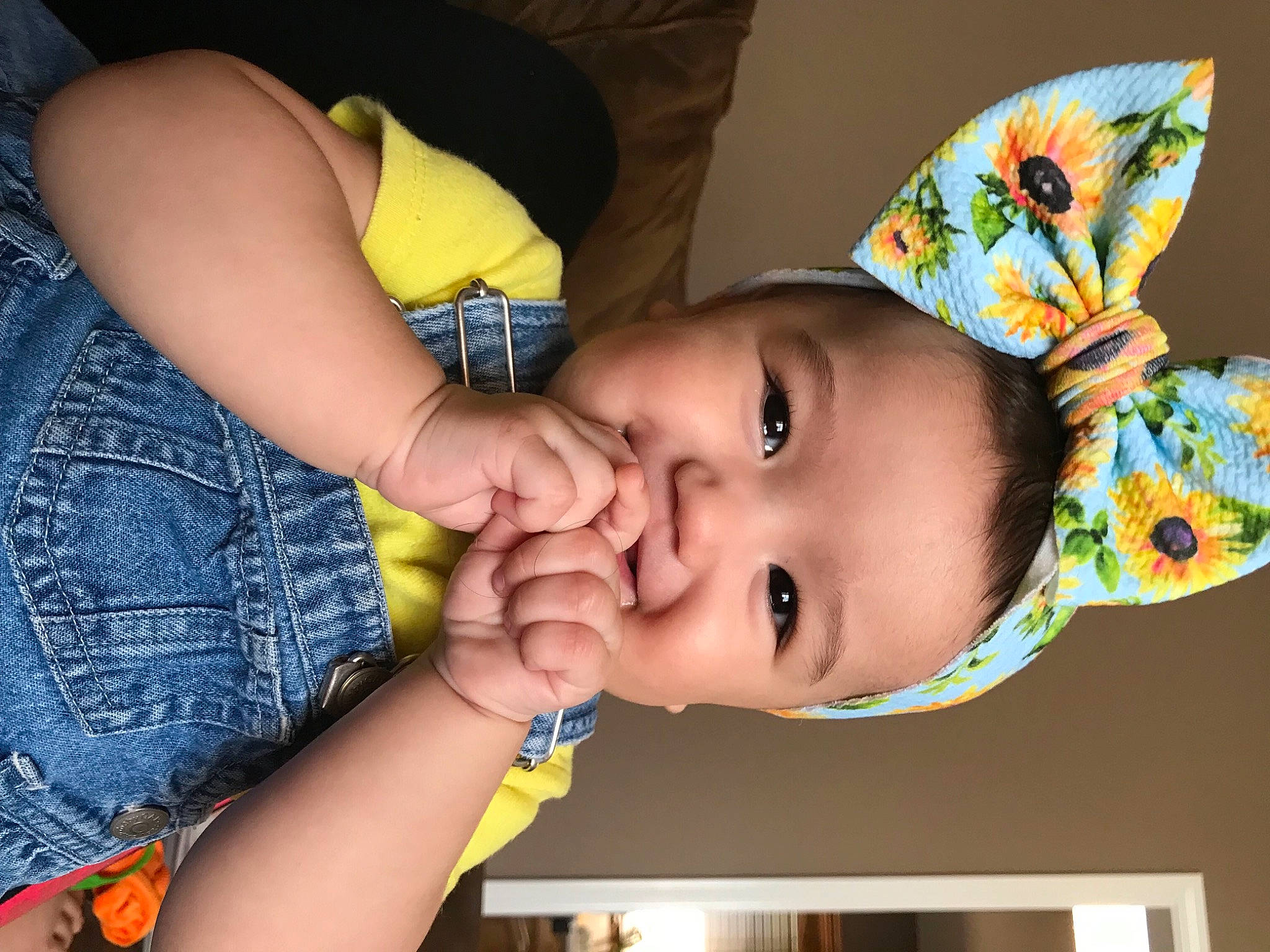 Luciana is registered to the contest to win money with this photo: baby, baby_toddler_clothing, cap, cheek, eye, eyebrow, finger, gesture, happy, headgear, human_body, iris, lip, mouth, neck, nose, person, skin, smile, toddler