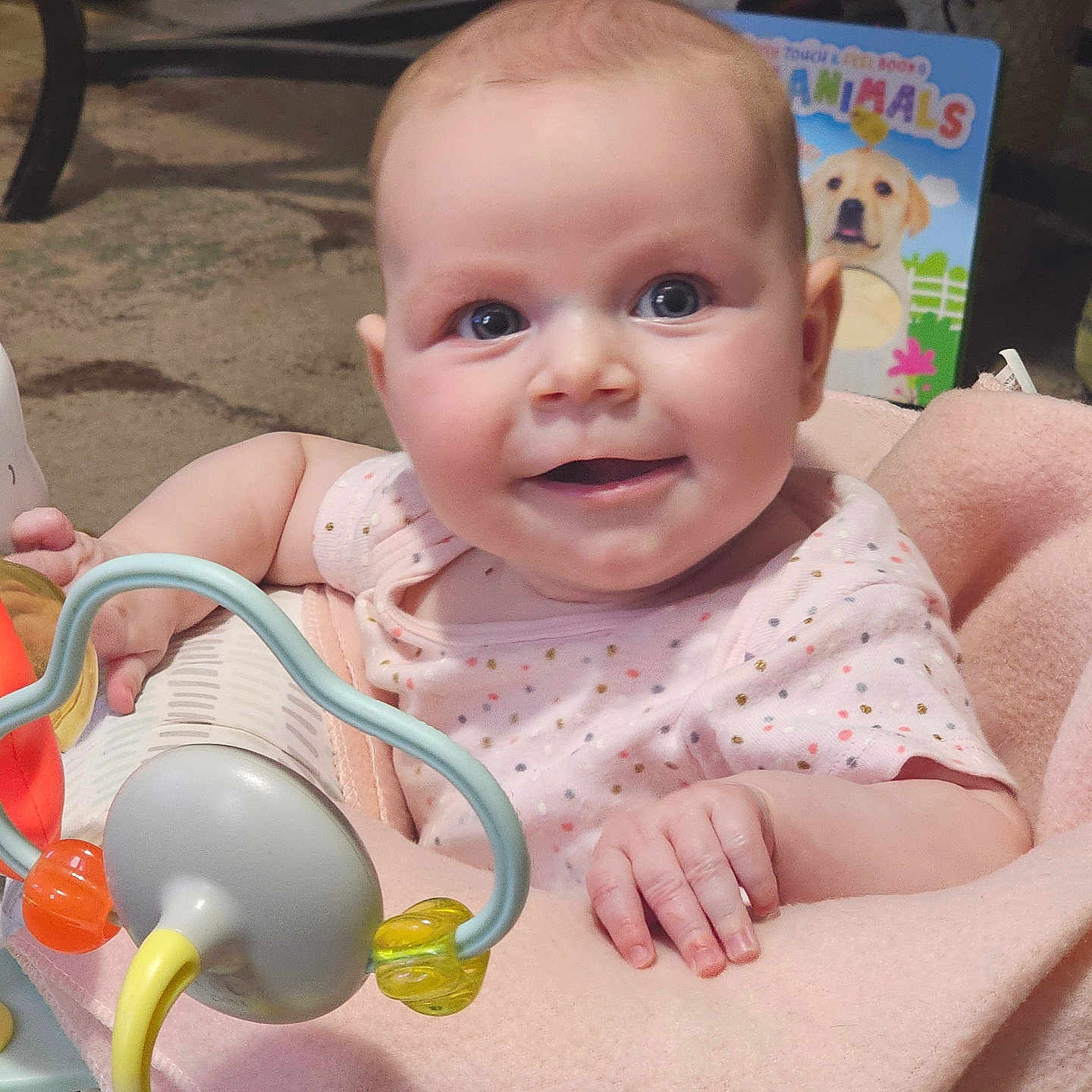 Bailey is registered to the contest to win money with this photo: architecture, baby, bodypart, building, clothing, couch, face, finger, furniture, hand, happy, head, hospital, newborn, person, photography, portrait, smile, t_shirt, toy