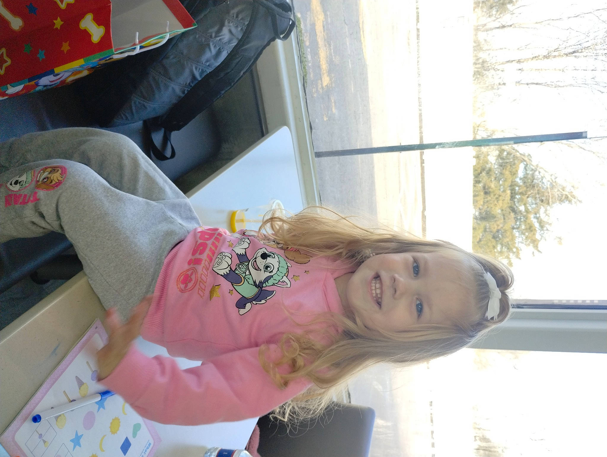 Briana is registered to the contest to win money with this photo: carmine, child, fun, happy, human_leg, joy, leisure, linens, person, plant, sky, toddler, toy, tree, vacation, visual_arts, window