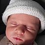 baby, child, closeup, clothing, cute, face, hat, headwear, infant, knitted, newborn, newborn_clothing, peaceful, portrait, resting, skin, sleeping, soft, tiny, young