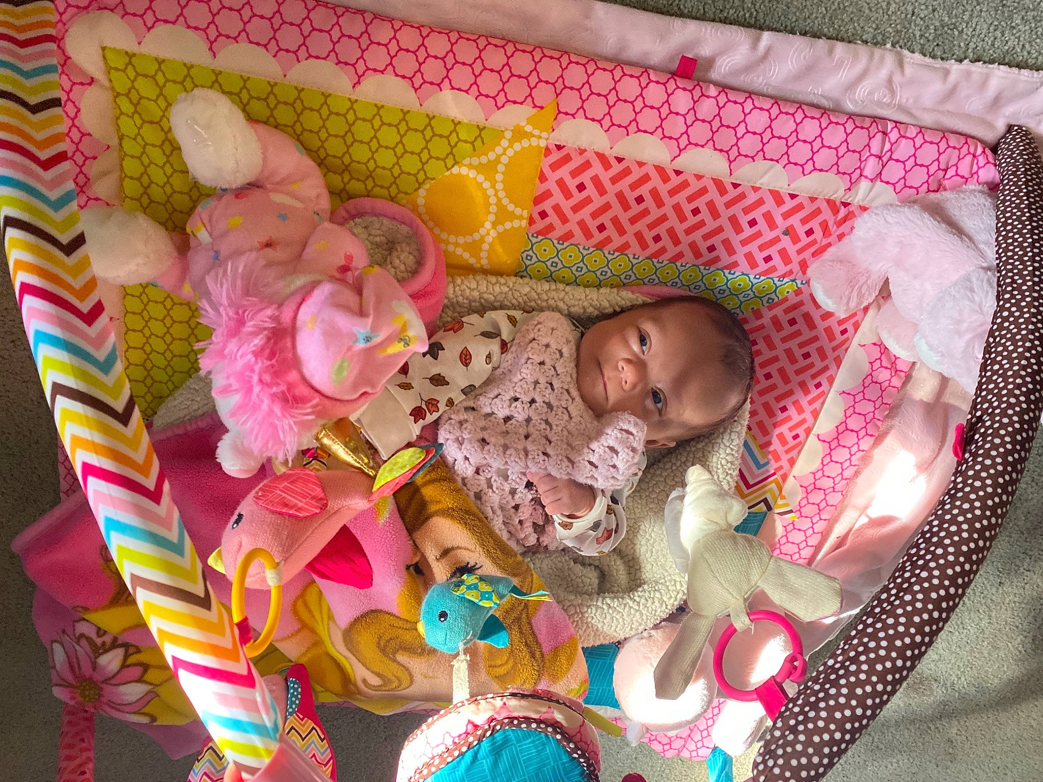 Luz Sofia is registered to the contest to win money with this photo: baby, baby_products, baby_safety, baby_toddler_clothing, bed, bed_sheet, bedding, bedtime, cheek, child, comfort, infant_bed, linens, magenta, pattern, person, pink, room, textile, toddler