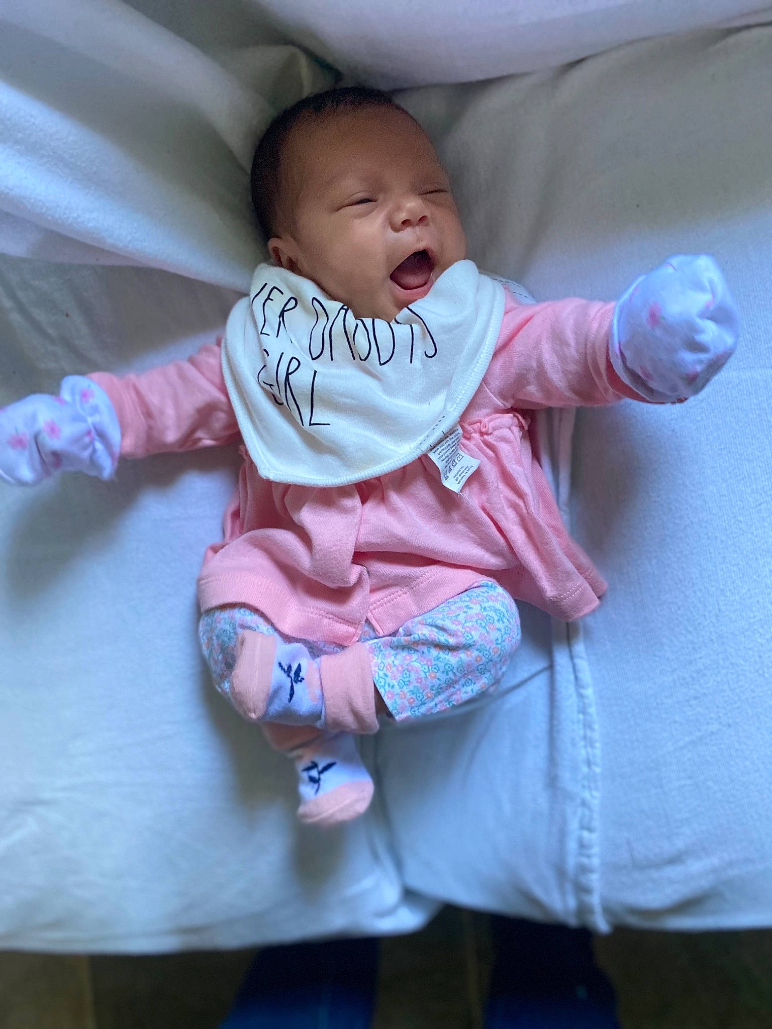 Luz Sofia is registered to the contest to win money with this photo: arm, baby, baby_toddler_clothing, cheek, child, comfort, eye, face, hand, joint, leg, magenta, mouth, person, pink, purple, shoulder, skin, sleeve, t_shirt