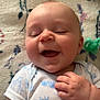 Hunter joined the competition — help win amazing prizes! baby, infant, smiling, onesie, hand, blanket, pacifier, happy, cute, face, skin, lying_down, child, pattern, blue, white, sleepy, closeup, indoors, soft