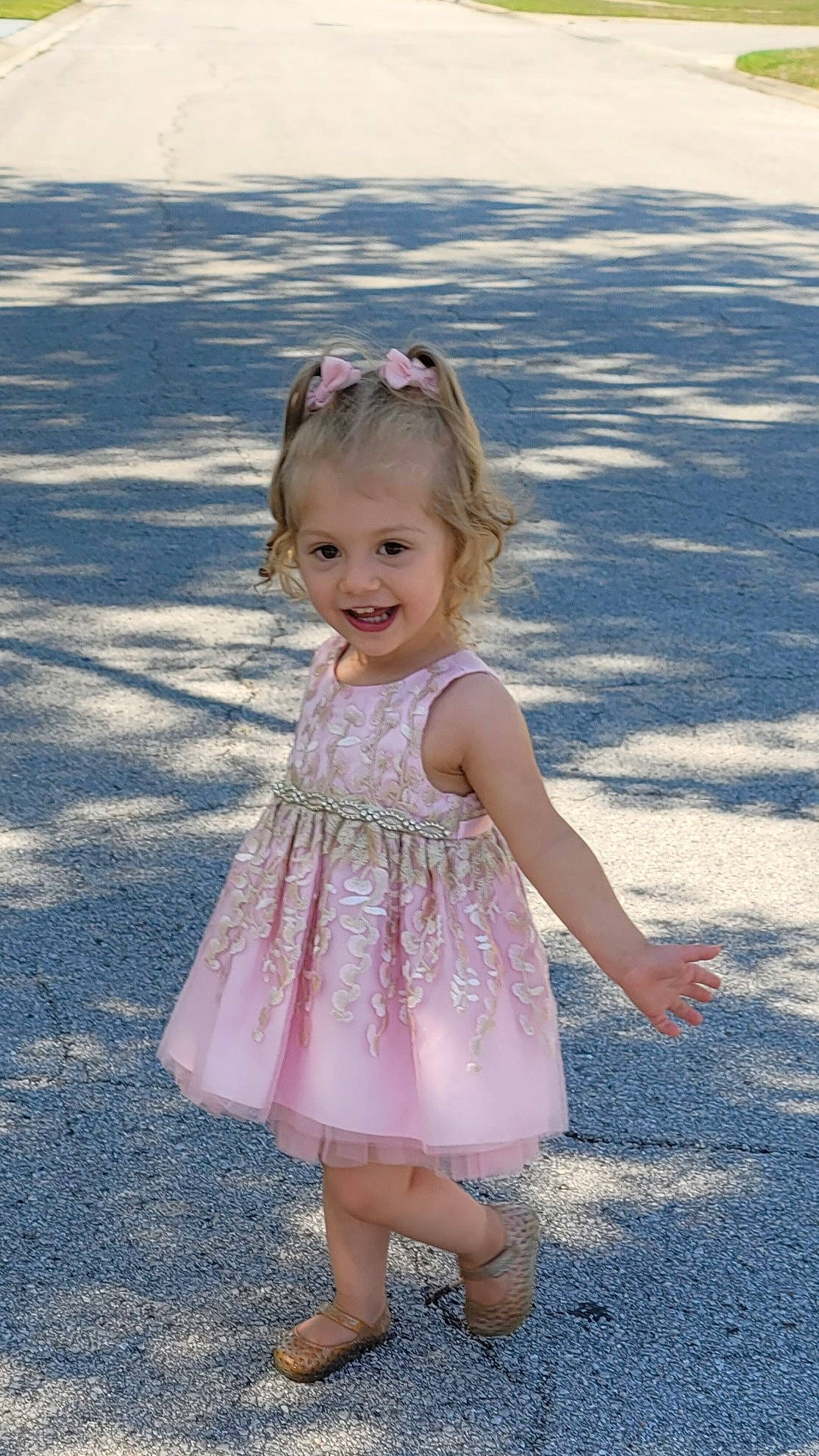 Mariah is registered to the contest to win money with this photo: baby_toddler_clothing, beauty, child, day_dress, dress, fun, grass, happy, head, joy, magenta, people_in_nature, person, pink, plant, skin, sleeve, smile, standing, summer