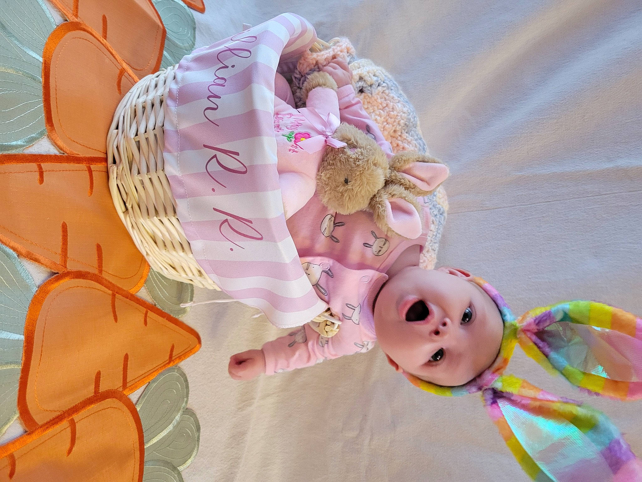 Lillian is registered to the contest to win money with this photo: art, baby, child, comfort_food, font, happy, magenta, paper, paper_product, party_supply, peach, person, petal, pink, plant, smile, stuffed_toy, sweetness, textile, toy