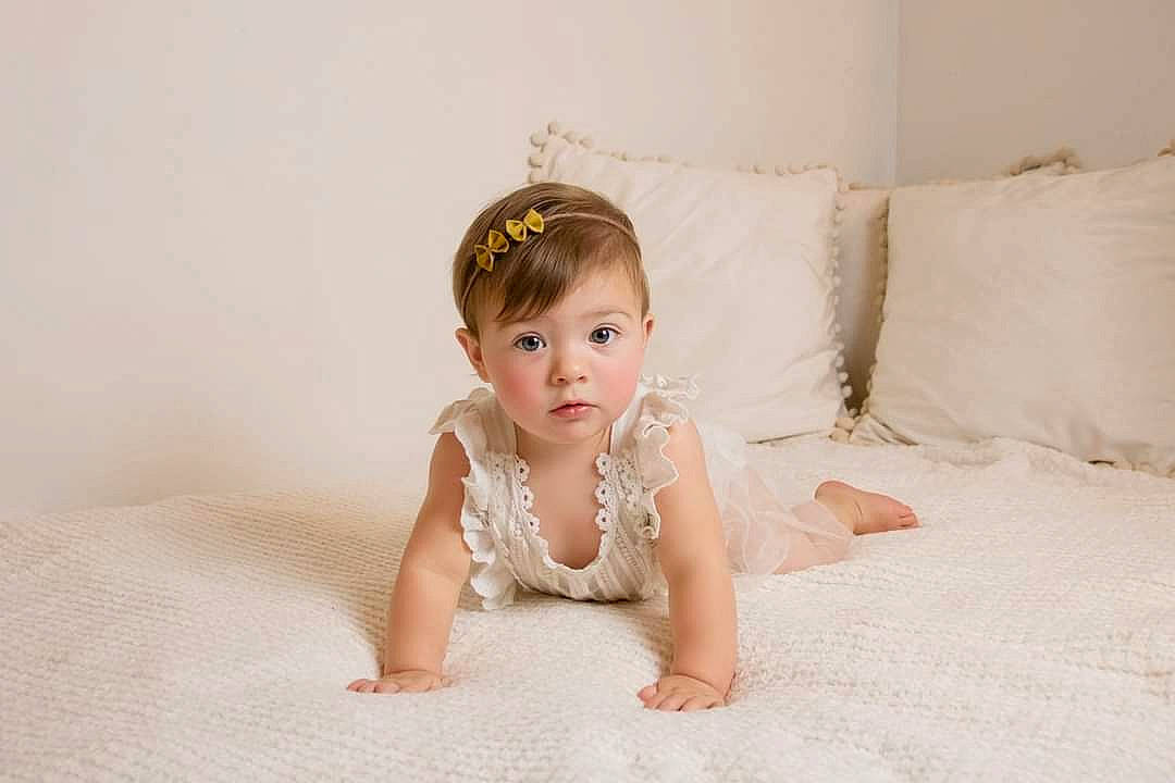 Lexi joined the competition — help win amazing prizes! arm, baby, baby_toddler_clothing, comfort, dress, eye, eyebrow, eyelash, face, flash_photography, floor, flooring, hair, happy, head, iris, leg, person, sleeve, textile