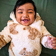 Raphael joined the competition — help win amazing prizes! baby, background, child, cozy, cute, expression, face, fluffy_clothing, hand, happy, head, hoodie, indoor, infant, joyful, person, portrait, smiling, toddler, warm_clothing