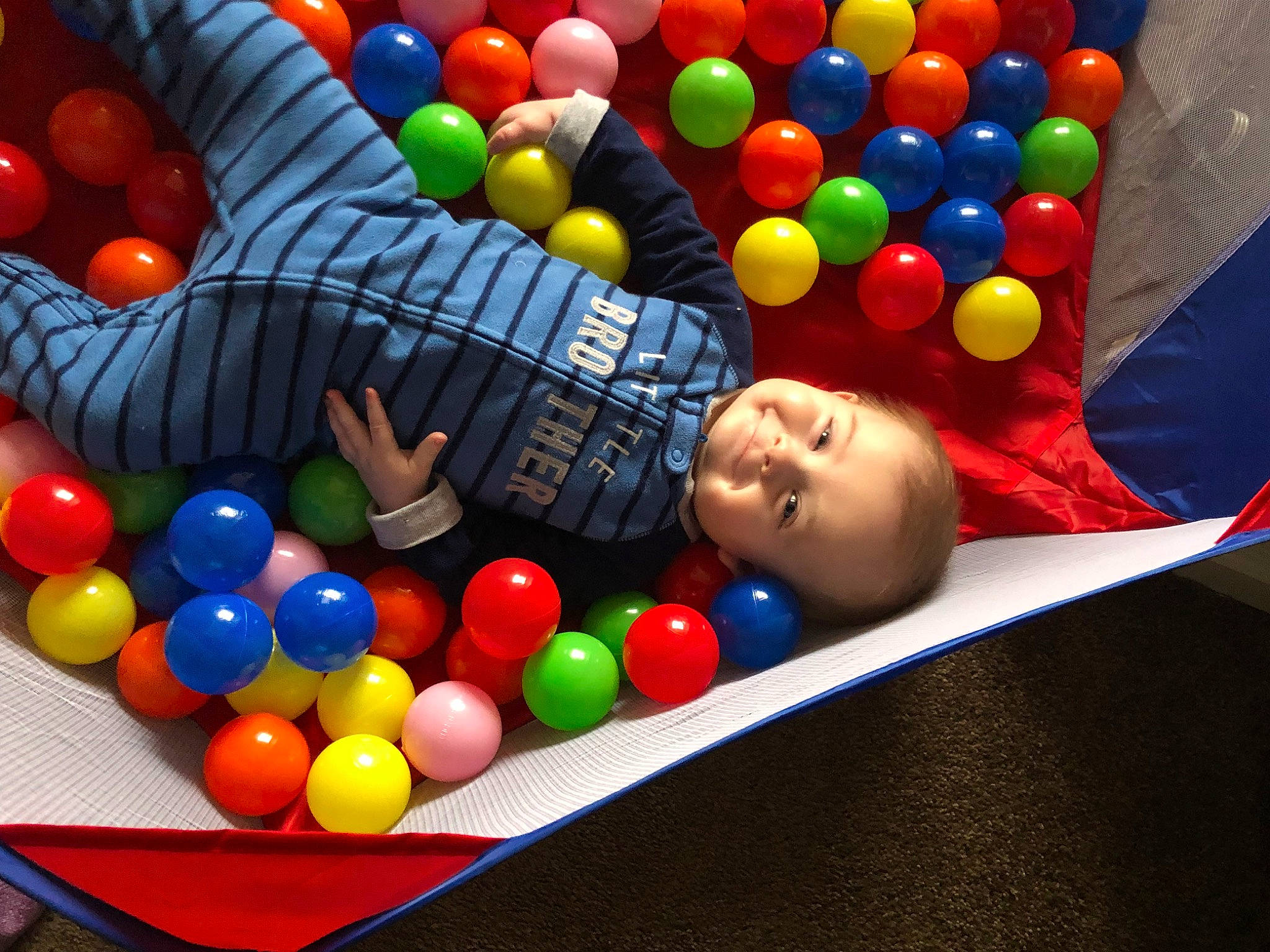 Brayden joined the competition — help win amazing prizes! baby, baby_toys, ball, ball_pit, black, child, circle, confectionery, event, fun, leisure, mixture, person, photograph, plastic, play, recreation, snapshot, sweetness, toddler