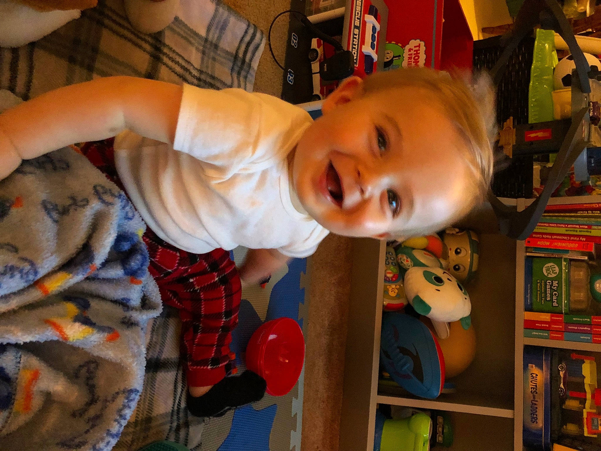 Brayden joined the competition — help win amazing prizes! baby, baby_toddler_clothing, baby_toys, chair, cheek, child, eye, fun, happy, joy, orange, pattern, person, play, room, shelf, shirt, smile, t_shirt, toddler