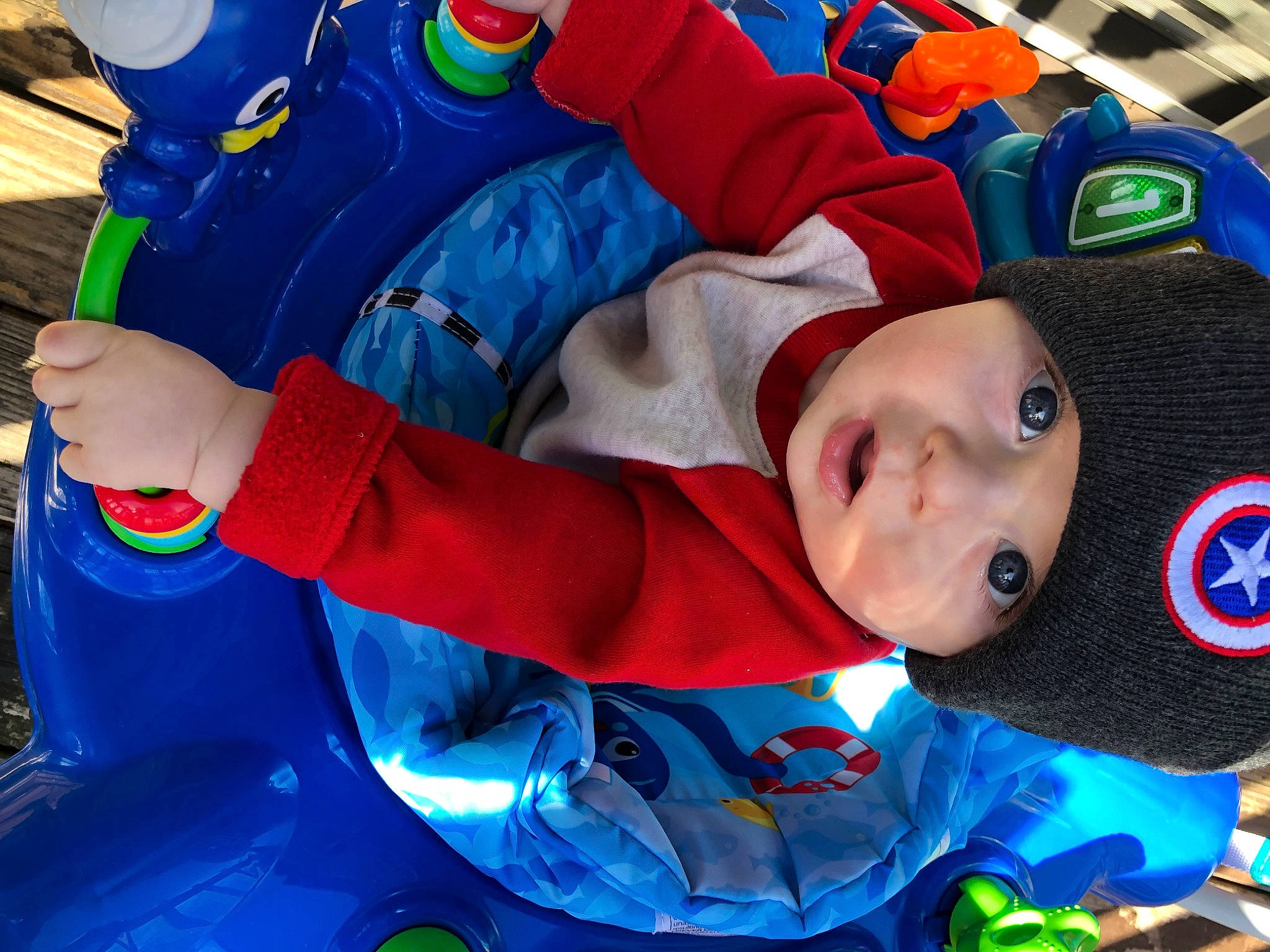 Brayden is registered to the contest to win money with this photo: baby, baby_products, baby_toddler_clothing, beanie, blue, cap, child, comfort, electric_blue, fictional_character, fun, headgear, headwear, leisure, mouth, outerwear, person, personal_protective_equipment, recreation, toddler