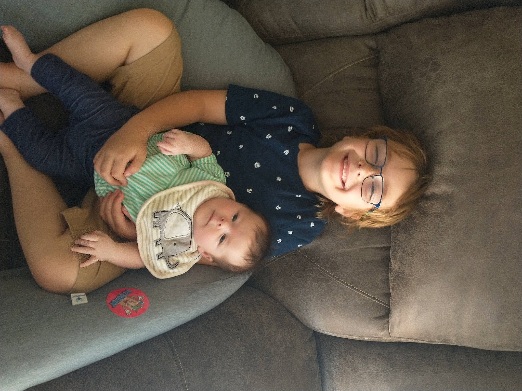 Evangeline joined the competition — help win amazing prizes! baby, child, comfort, couch, eye, flash_photography, fun, happy, human_leg, joy, knee, lap, leg, leisure, mammal, nap, person, sitting, smile, thigh
