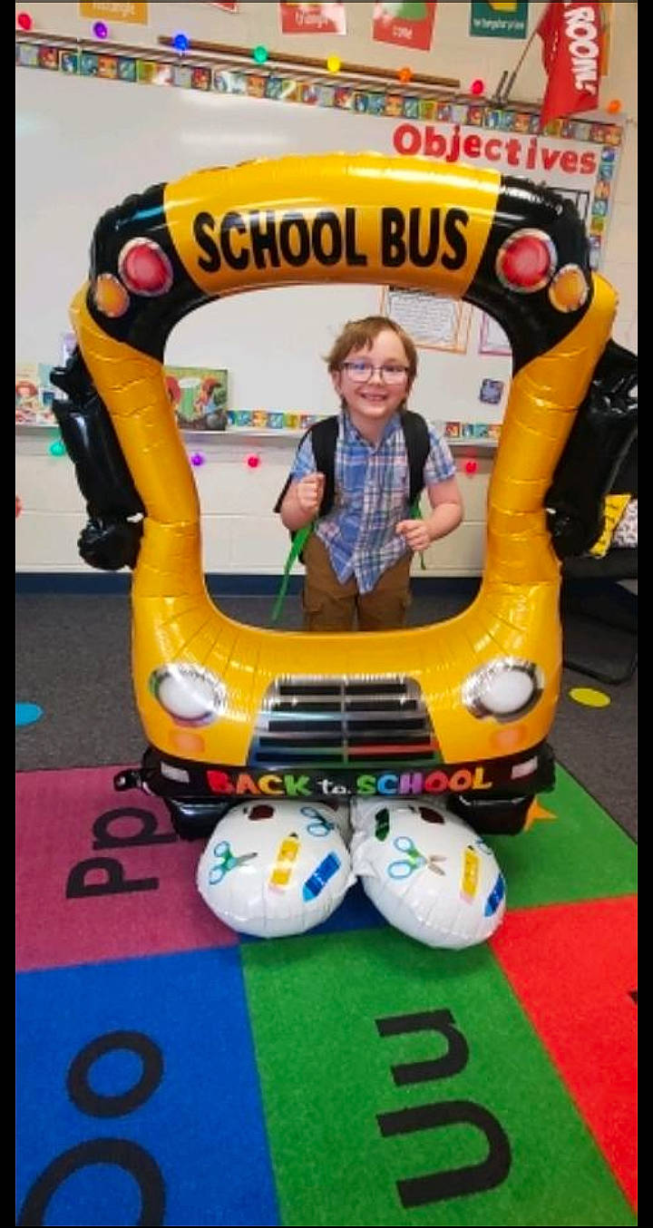 Leslie is registered to the contest to win money with this photo: automotive_design, automotive_exterior, automotive_tire, automotive_wheel_system, bumper, car, electronic_device, font, joy, leisure, motor_vehicle, person, personal_protective_equipment, photograph, recreation, smile, snapshot, sports_gear, tire, vehicle