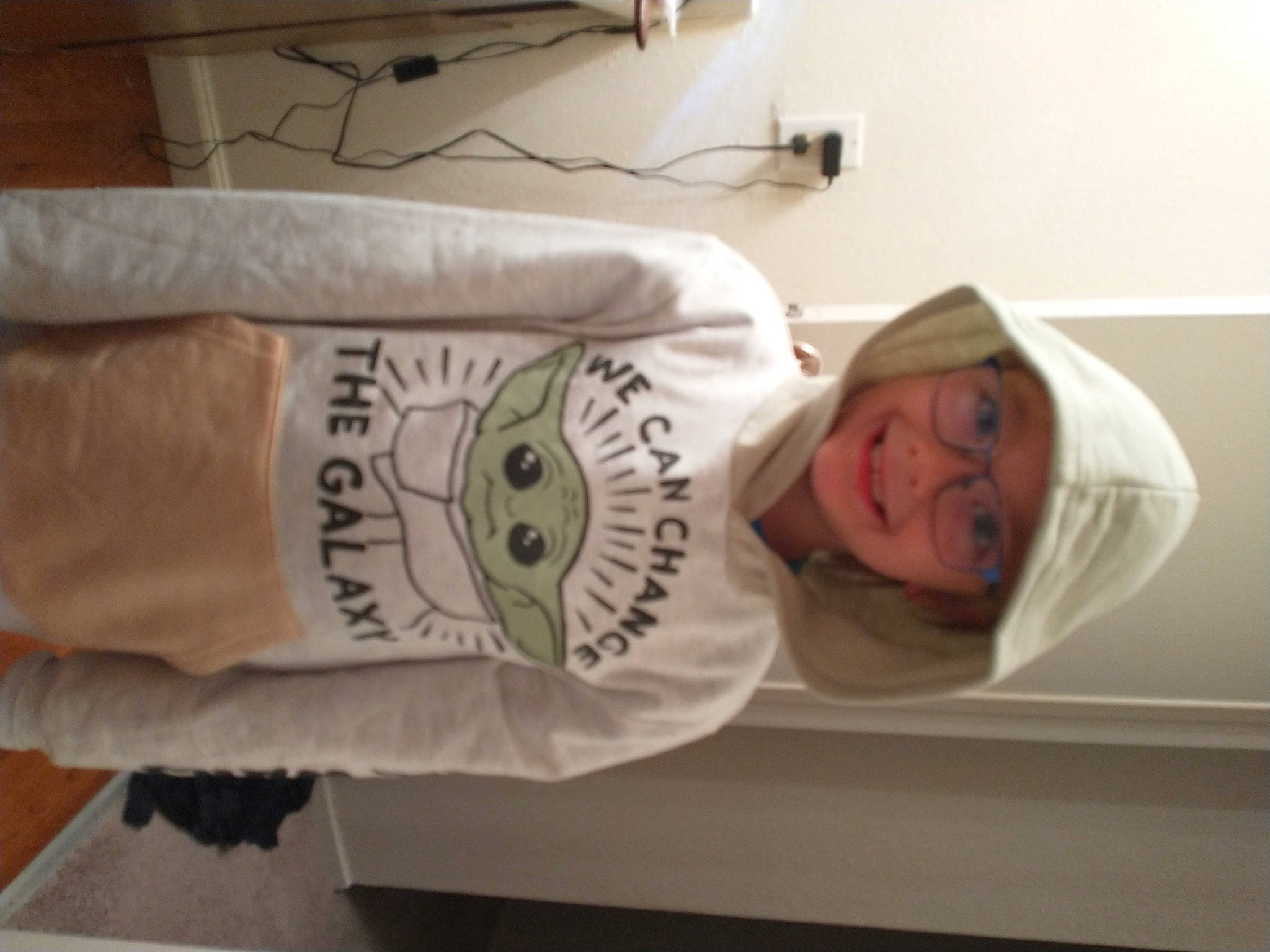 Leslie is registered to the contest to win money with this photo: child, comfort, elbow, event, headwear, joy, linens, person, room, sleeve, wood