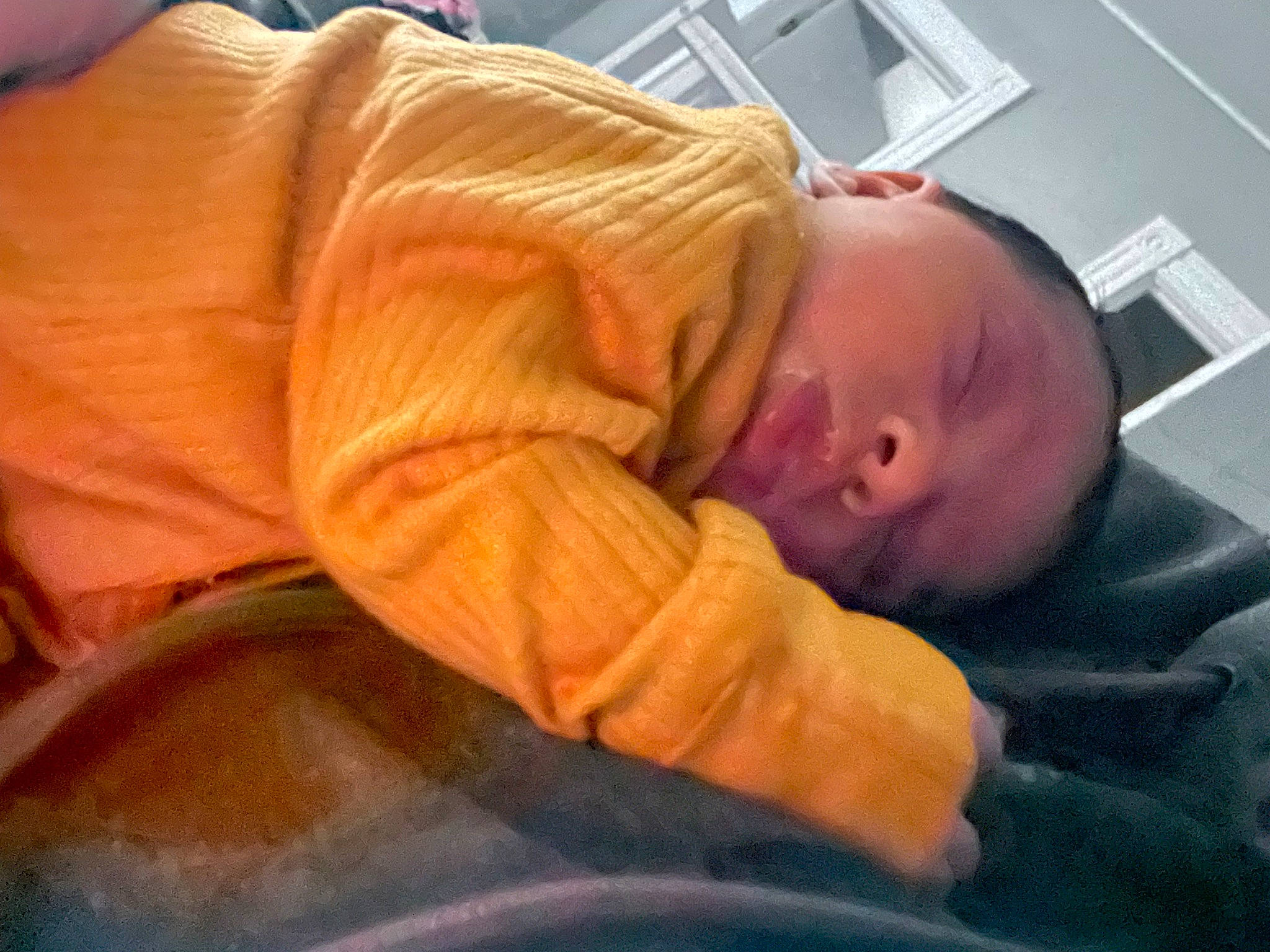 Alannah joined the competition — help win amazing prizes! baby, baby_sleeping, bedtime, cheek, child, comfort, elbow, fun, linens, nap, nose, orange, person, room, sitting, sleep, toddler