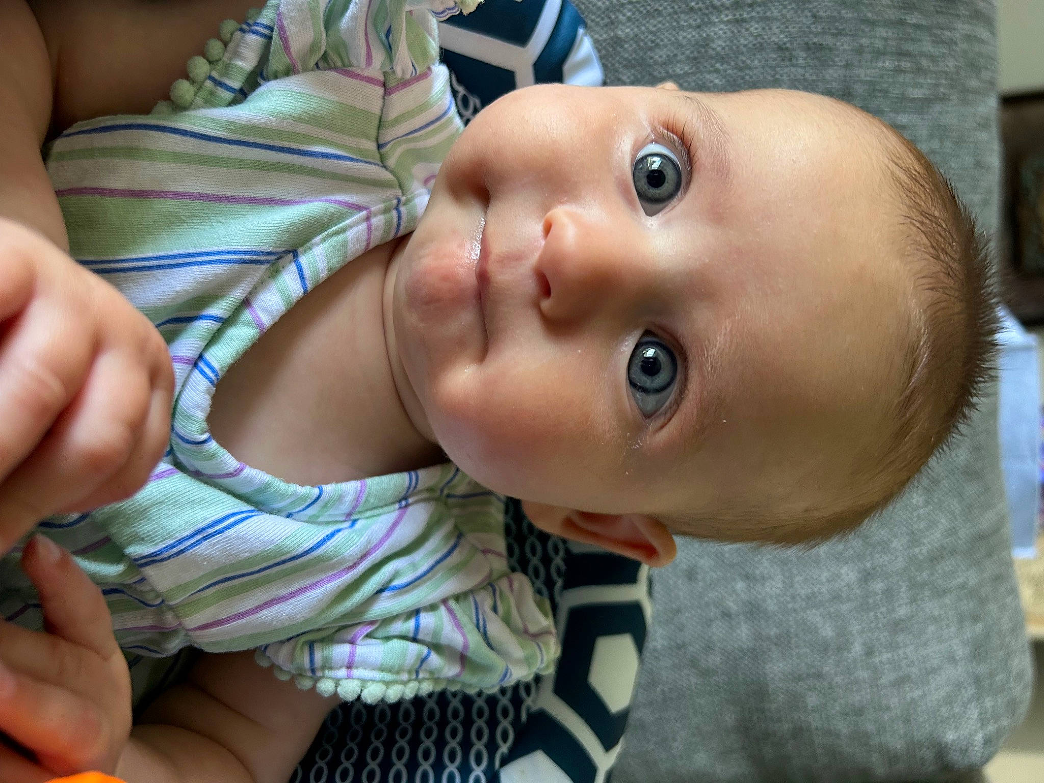 Kamryn is registered to the contest to win money with this photo: baby, baby_toddler_clothing, cheek, child, eye, eyebrow, eyelash, grass, happy, iris, lip, mouth, nose, person, plant, skin, smile, toddler, toy, water