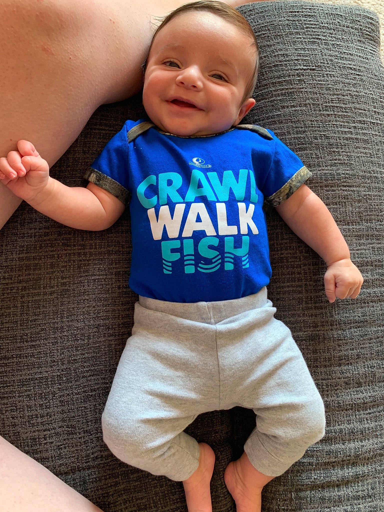 Cayde is registered to the contest to win money with this photo: baby, baby_products, baby_toddler_clothing, blue, child, diaper, person, product, shorts, sleeve, t_shirt, toddler, turquoise