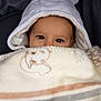 baby, child, blanket, hood, ears, cute, face, eyes, infant, cozy, warm, soft, fabric, animal_print, snuggled, portrait, closeup, car_seat, baby_clothing, adorable