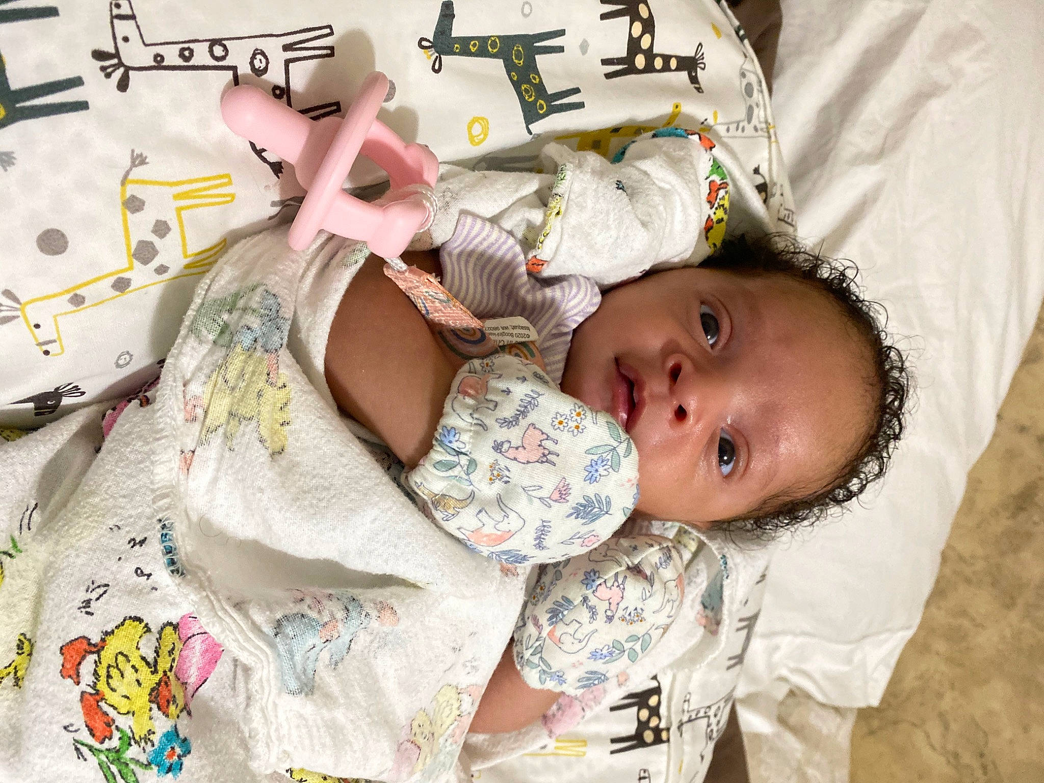 Kendall is registered to the contest to win money with this photo: art, baby, baby_products, baby_toddler_clothing, bedding, cheek, child, comfort, eyelash, hand, happy, linens, pattern, person, product, skin, sleeve, t_shirt, textile, toddler