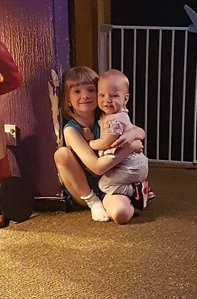 Breanna is registered to the contest to win money with this photo: baby, child, daughter, fun, interaction, joy, lap, leg, person, sitting, skin, smile, snapshot, toddler