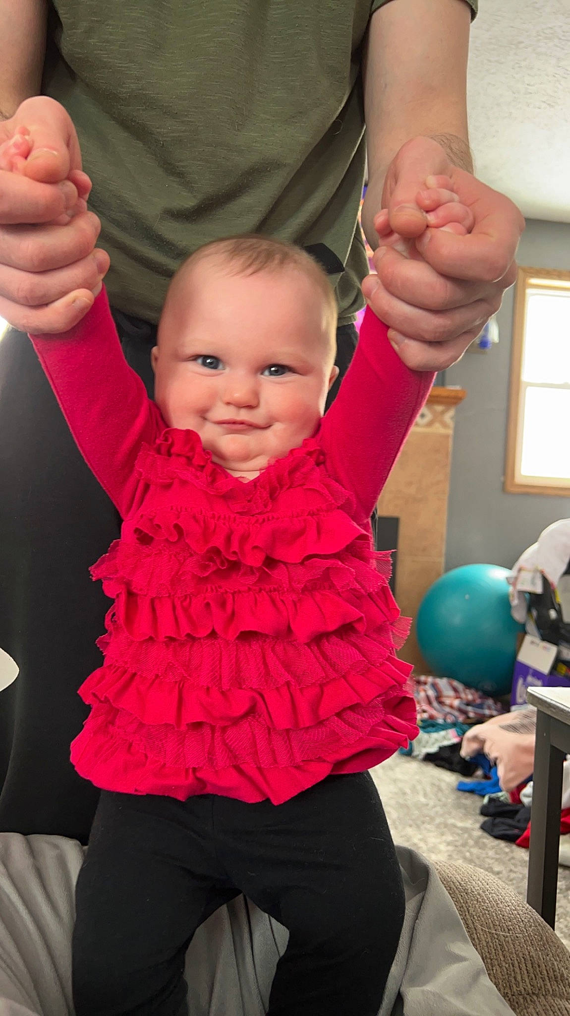 Amelia is registered to the contest to win money with this photo: baby, baby_toddler_clothing, child, finger, fun, gesture, hand, happy, joint, joy, leisure, magenta, muscle, person, pink, purple, shoulder, sleeve, smile, standing