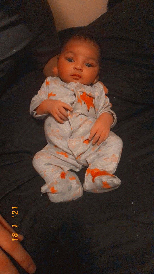 Javon joined the competition — help win amazing prizes! baby, baby_toddler_clothing, cheek, child, chin, comfort, eye, face, finger, flooring, foot, hand, head, human_leg, nose, person, skin, sleeve, thumb, toddler