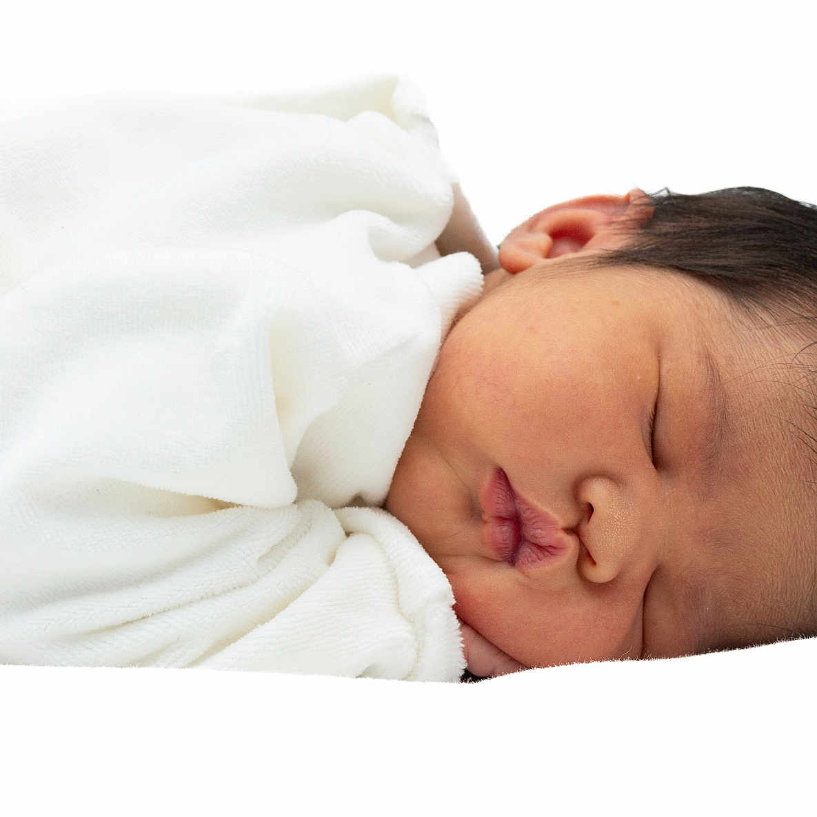 Tia participe au concours pour gagner de l'argent avec cette photo : baby, newborn, sleeping, infant, blanket, soft, closeup, face, pout, peaceful, cozy, white, resting, child, cute, skin, hair, portrait, toddler, young
