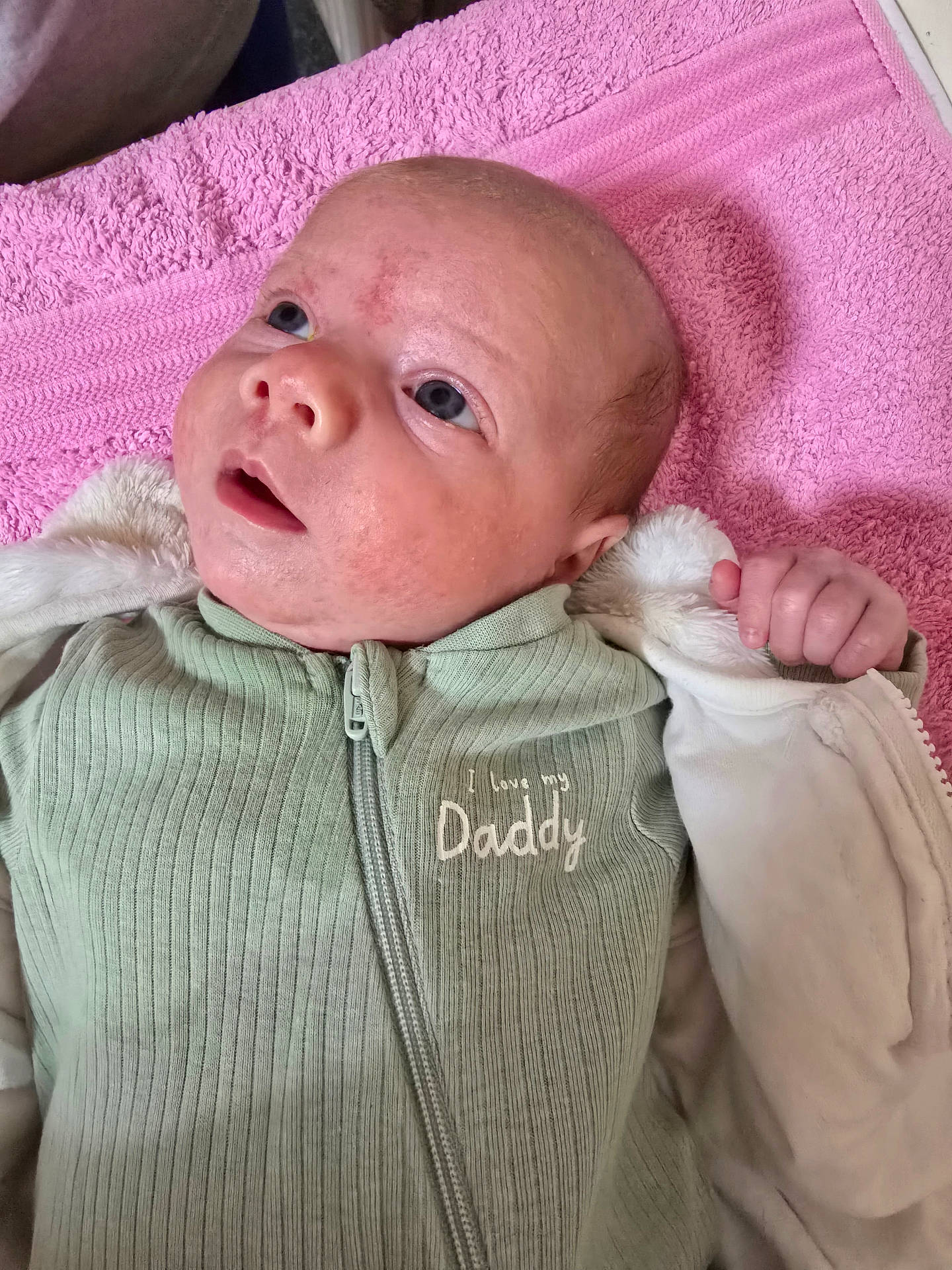 Fabiola is registered to the contest to win money with this photo: baby, blanket, bodypart, clothing, coat, cushion, face, finger, hand, head, homedecor, jacket, knitwear, newborn, person, photography, portrait, purple, quilt, sweater