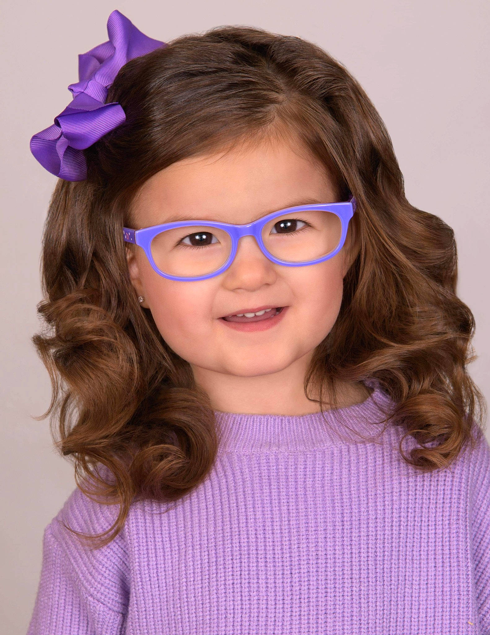 Makenzie is registered to the contest to win money with this photo: azure, cheek, chin, eye, eyebrow, eyelash, eyewear, face, facial_expression, forehead, glasses, hair, hairstyle, joy, lip, person, product, purple, skin, smile