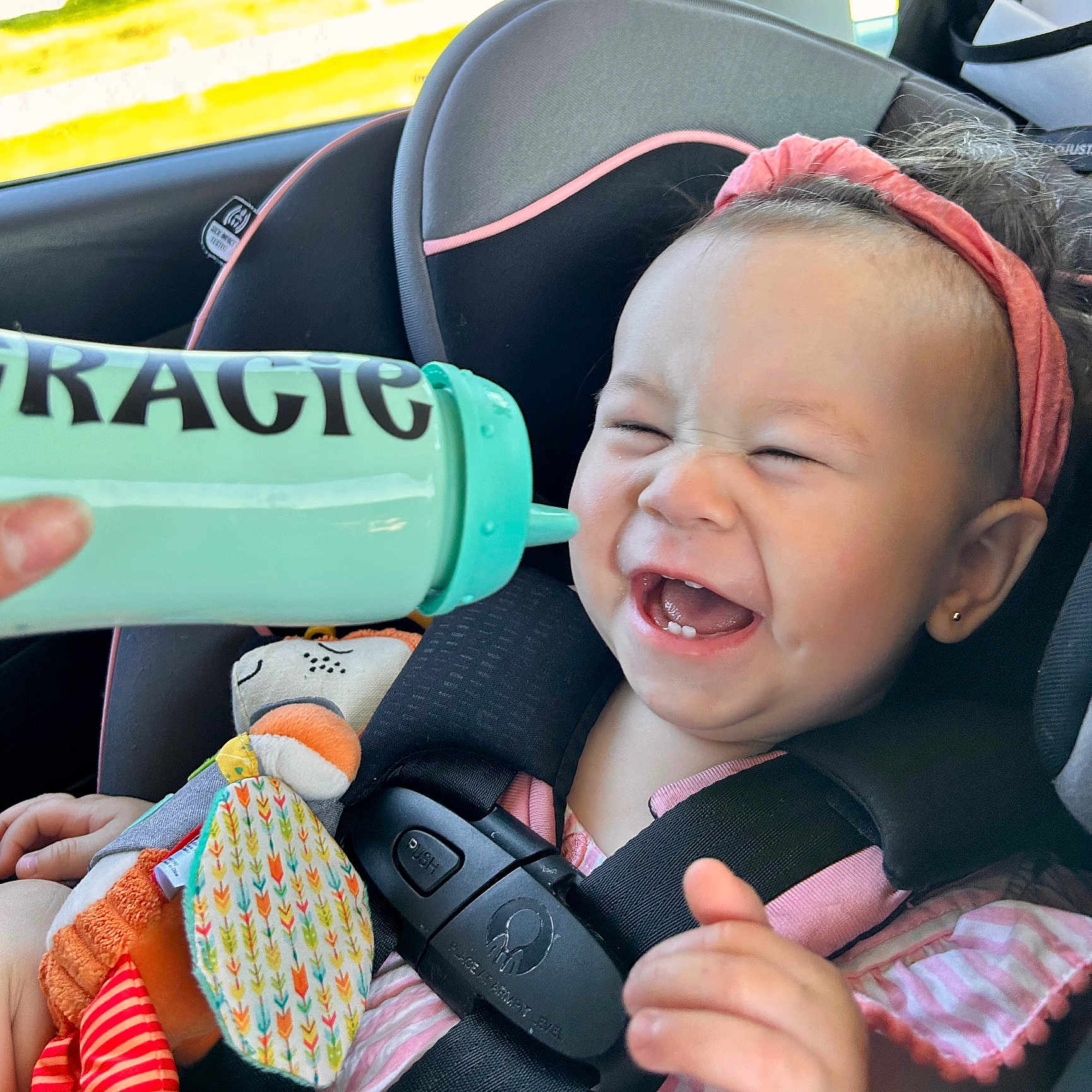 Gracie joined the competition — help win amazing prizes! accessories, baby, babylaughing, bag, car, car_interior, carseat, cushion, face, handbag, happy, head, homedecor, laughing, person, photography, portrait, smile, transportation, vehicle