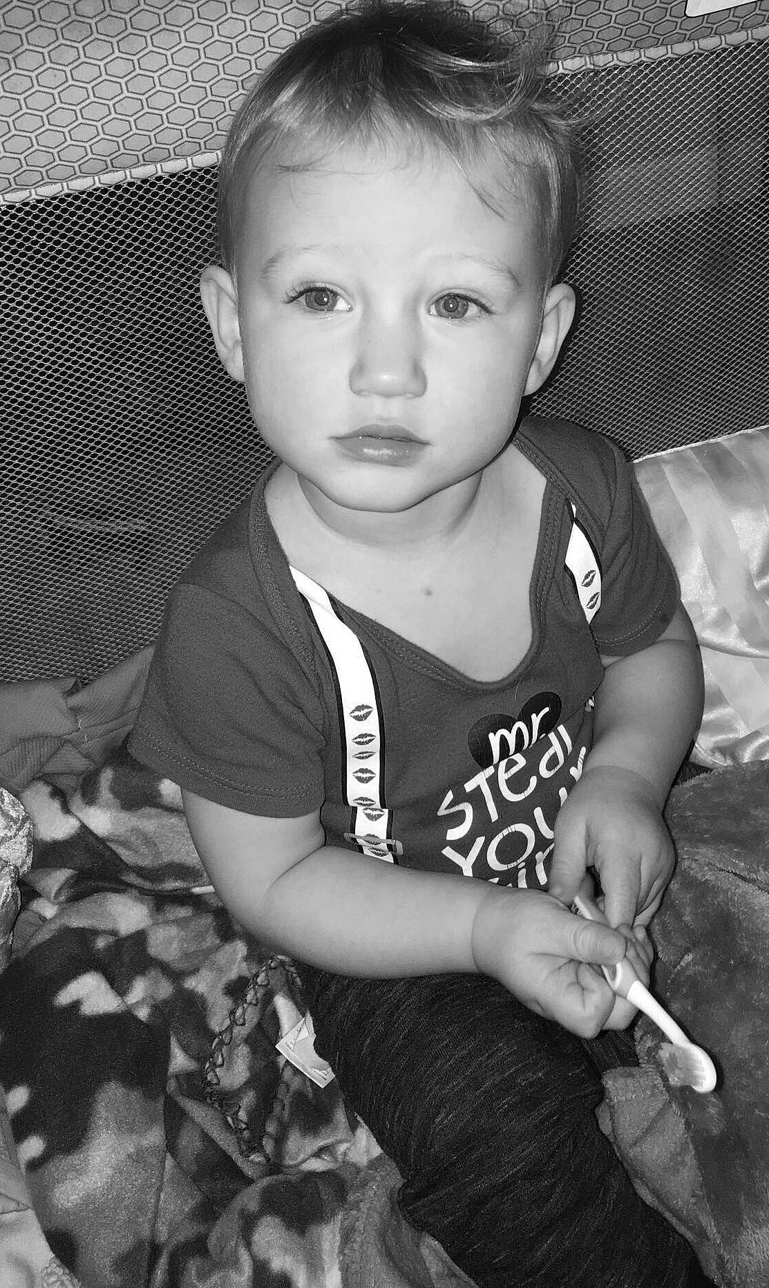 Kyson is registered to the contest to win money with this photo: baby, black_and_white, child, eye, face, monochrome, monochrome_photography, person, photograph, photography, smile, snapshot, style, toddler