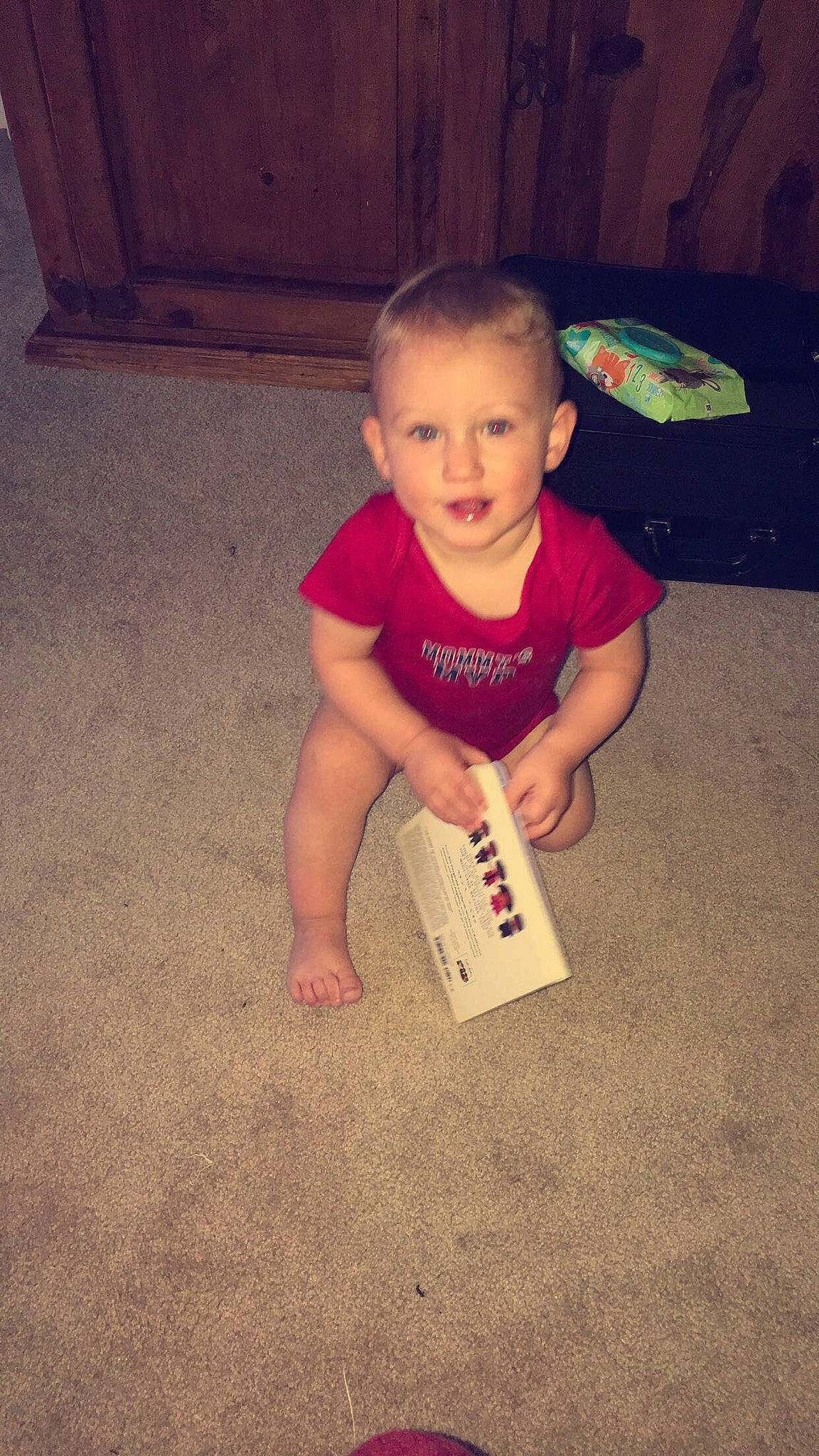 Kyson is registered to the contest to win money with this photo: arm, baby, barefoot, child, finger, floor, flooring, joint, leg, person, play, skin, toddler