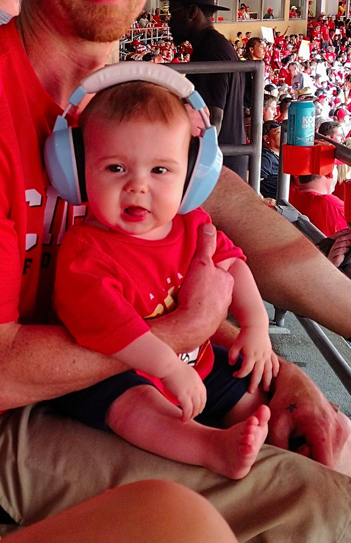 Warren is registered to the contest to win money with this photo: baby, baby_toddler_clothing, beauty, child, cool, finger, fun, hairstyle, happy, human_leg, jewellery, lap, magenta, person, photograph, pink, red, skin, thigh, thumb