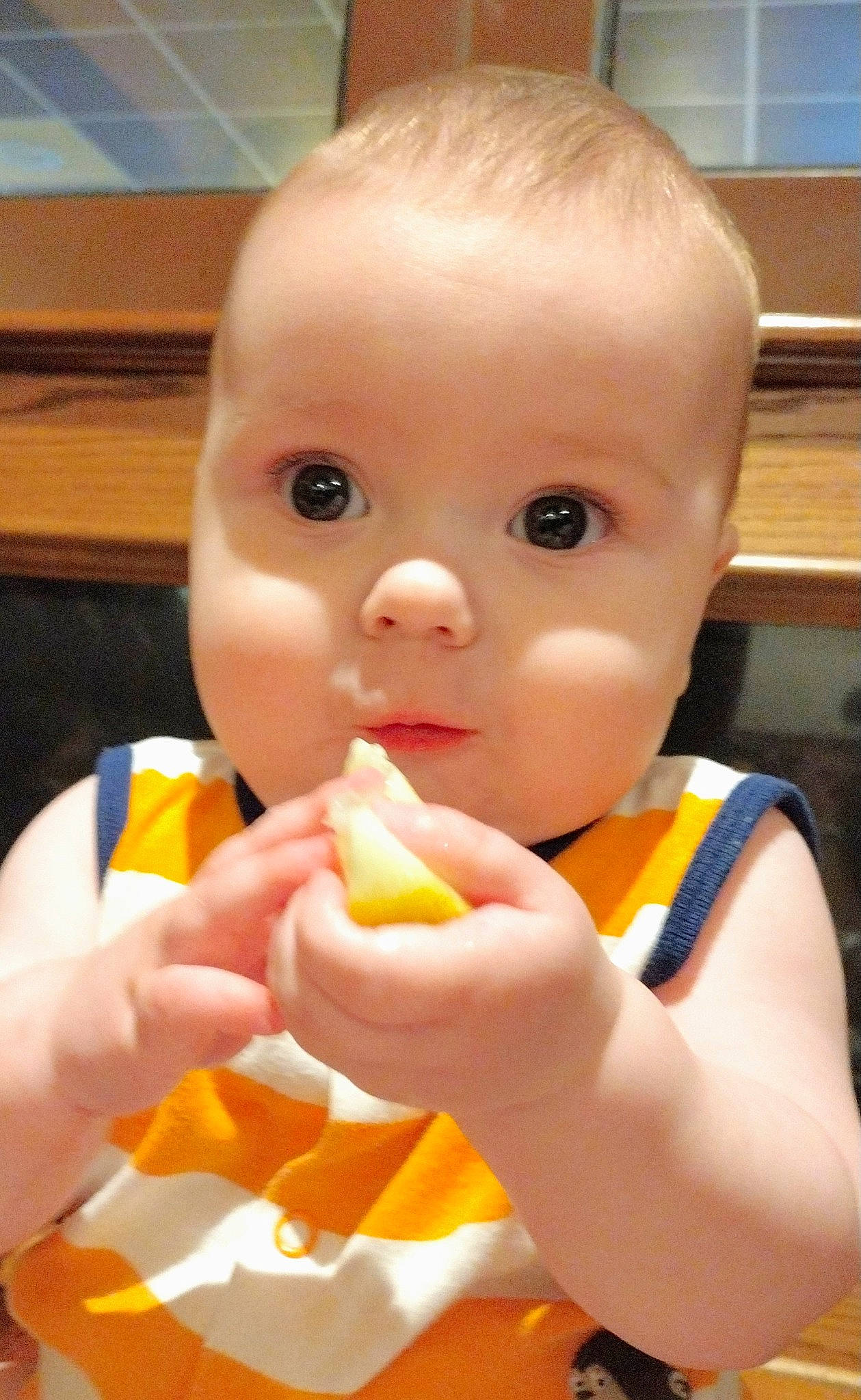Warren is registered to the contest to win money with this photo: baby, baby_products, baby_toys, biting, cheek, child, comfort_food, eating, finger_food, food_craving, fun, gesture, hand, junk_food, nail, nose, person, sweetness, thumb, toddler